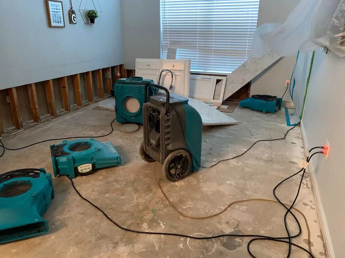 Dehumidifier in flood-cut room for Water Damage Restoration in Massac